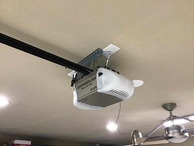 Garage door opener installed and wired in a San Antonio home