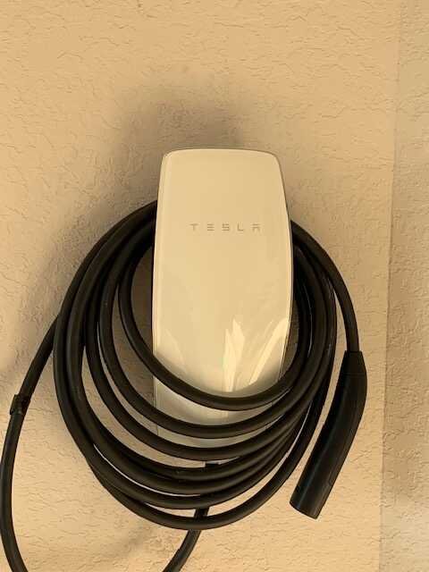 Tesla wall charger installed in a San Antonio home garage